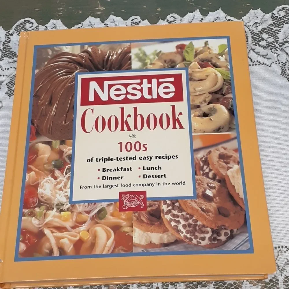 3-pc. Nestle's chocolate bundle: 2 vintage‎ tins and a hardcover cookbook